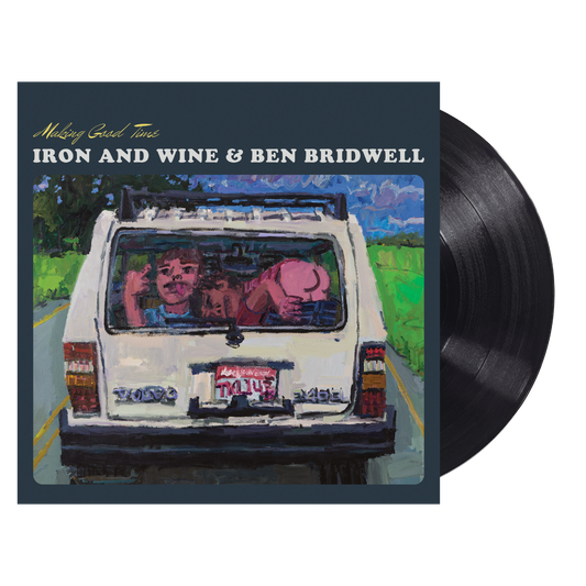 Vinyl record with cover featuring a car and two people, titled 'Melting Coral Tones' by Iron and Wine & Ben Bridwell.